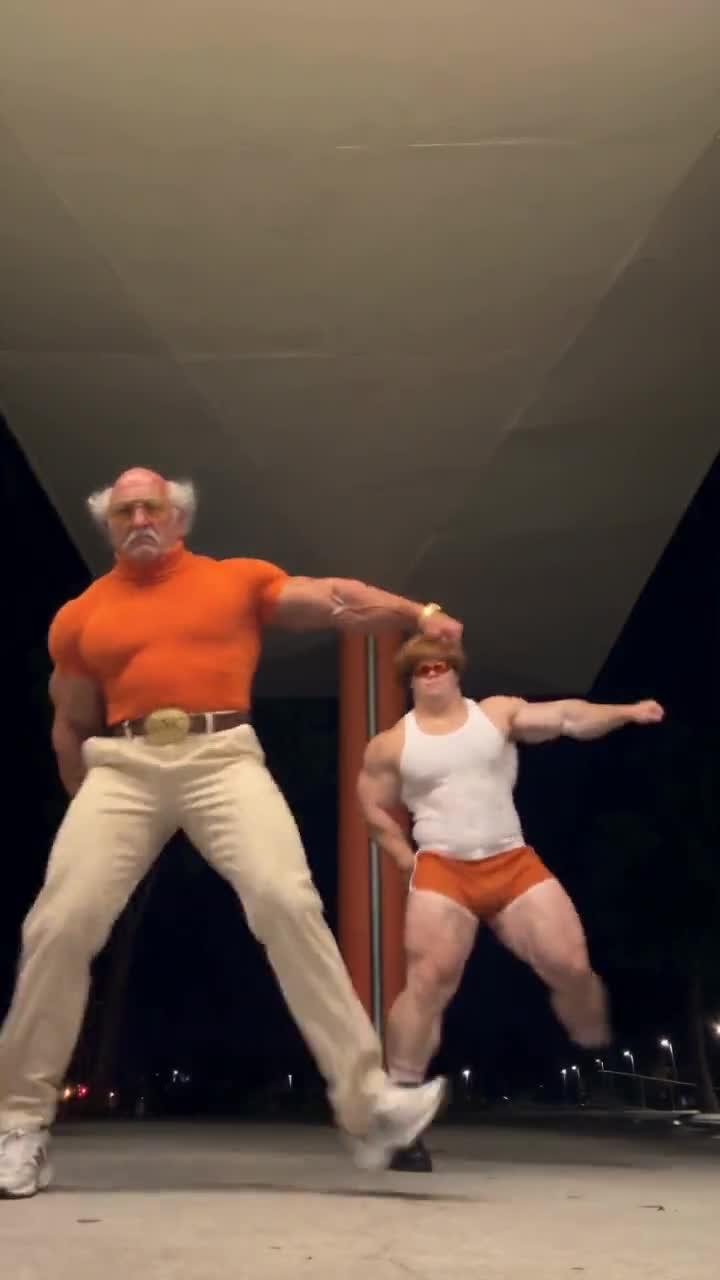 A Genjudo motion transfer: two dancers from a night-time clip re-cast as two original characters, beat for beat